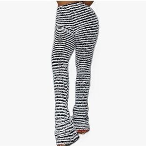 Black and White Flare Jeans with Bold Stripes stacked leggings